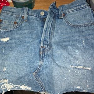 A denim washed Levi mini skirt